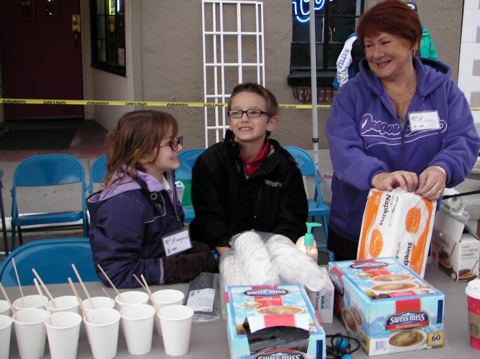 Serving hot chocolate to guests were Margurite and Graham Zeme and Luci Zuend.