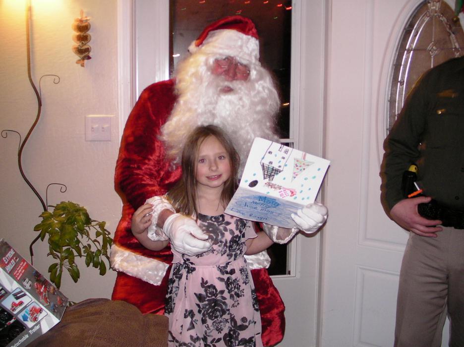 Olivia Reyes, 6, shares a letter to Santa.