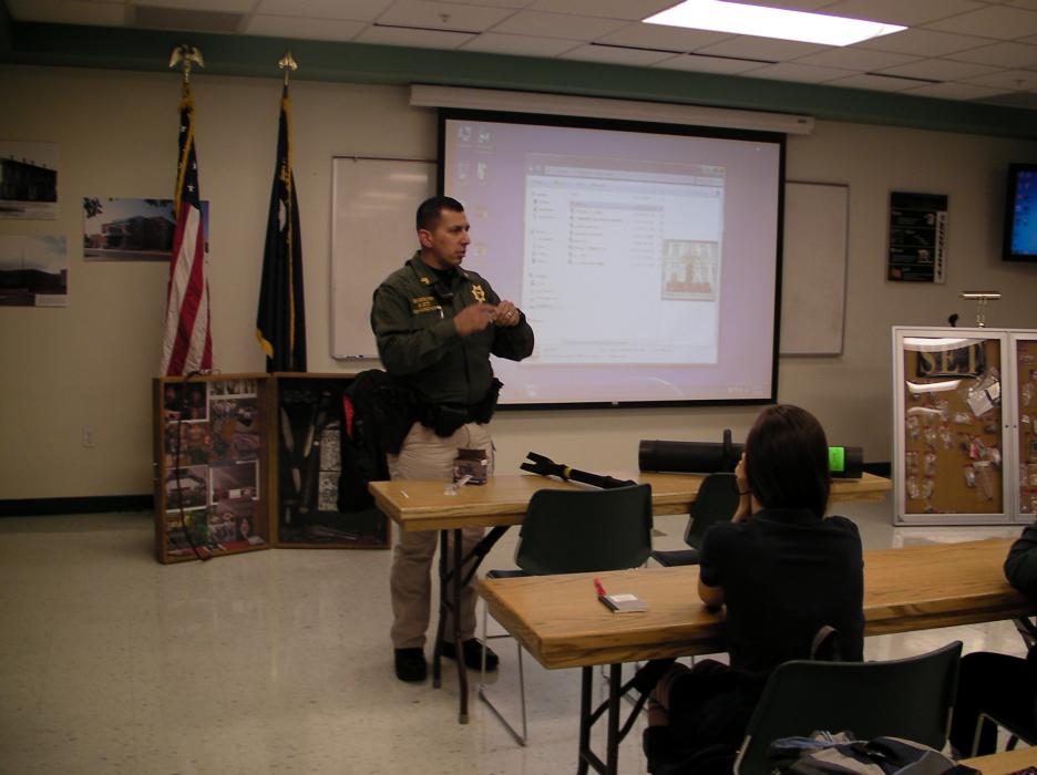Sgt. Daniel Gonzales gives a presentation to students about CCSO's SET operation.