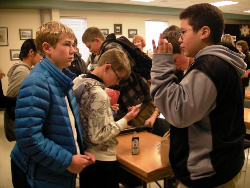 GATE students David Barrientos, Jens Robison and Kenny Fox at the sheriff's office Wednesday.