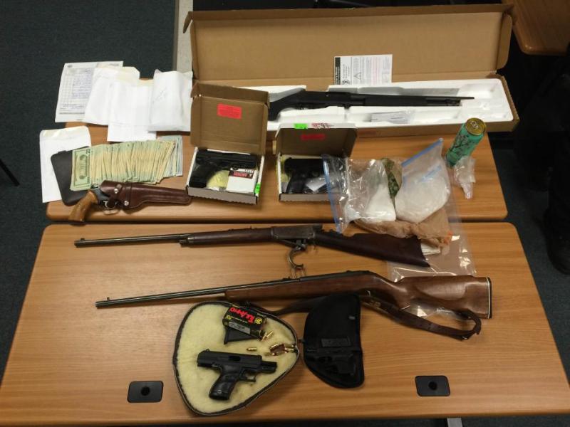 Meth, weapons and cash were seized. Photo courtesy of the Lyon County Sheriff's Office