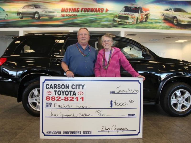 Dana Whaley of Carson City Toyota Scion presents a $4,000 donation to Terry Palmitier of Austin’s House. Photo by Conrad Buedel