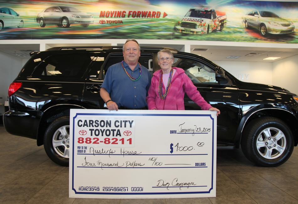 Dana Whaley of Carson City Toyota Scion presents a $4,000 donation to Terry Palmitier of Austin’s House. Photo by Conrad Buedel