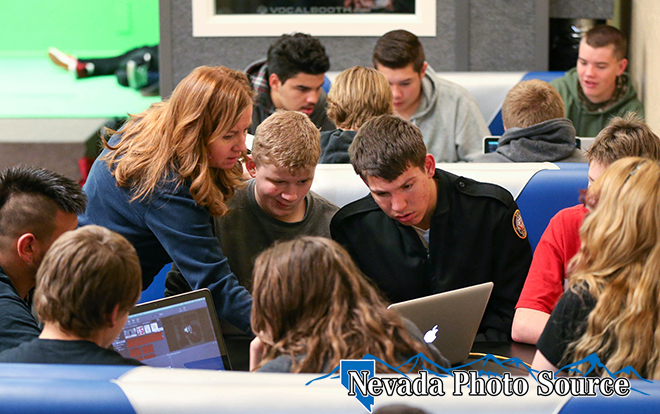 Molly Walt, Carson City Library out-of-school time coordinator, works CHS students.  Photo by Cathleen Allison