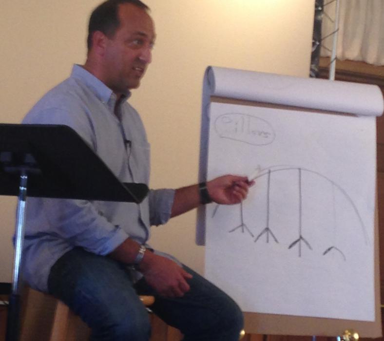 Ian Hill, a business leader and international motivational speaker, began talking at 6 a.m. Thursday