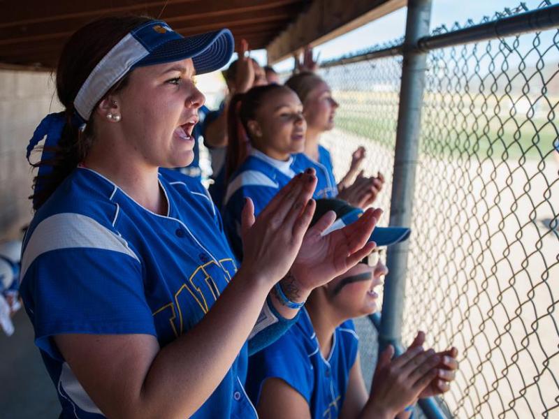 WNC's Hannah Russo cheers for her teammates in the dugout. File Nevada Photo Source