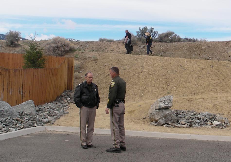 Sheriff Furlong and Assistant Sheriff Ken Sandage at the command post near Lone Mountain Cemetery.