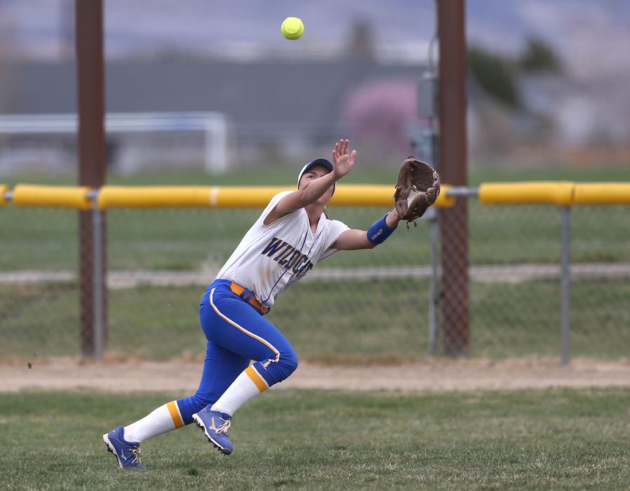 Wildcats' Melanie Mecham makes a catch during a game Friday at Edmonds Sports Complex in Carson City. Photo: Nevada Photo Source