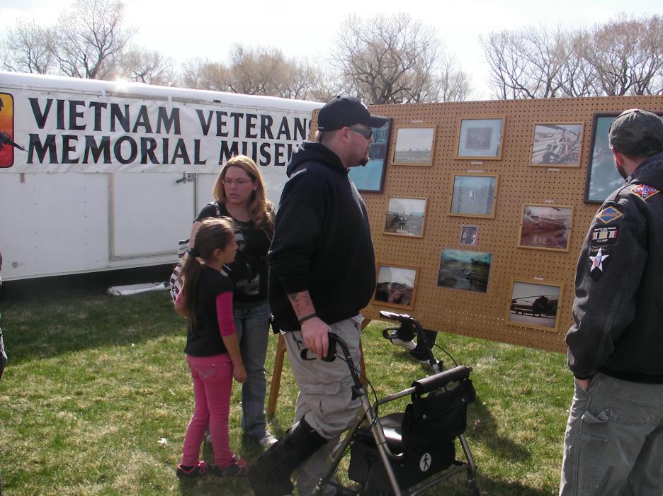 Charles McAlexander, wife Kristen and daughter Clara at the celebration. Charles served six years infantry in Afghanistan.
