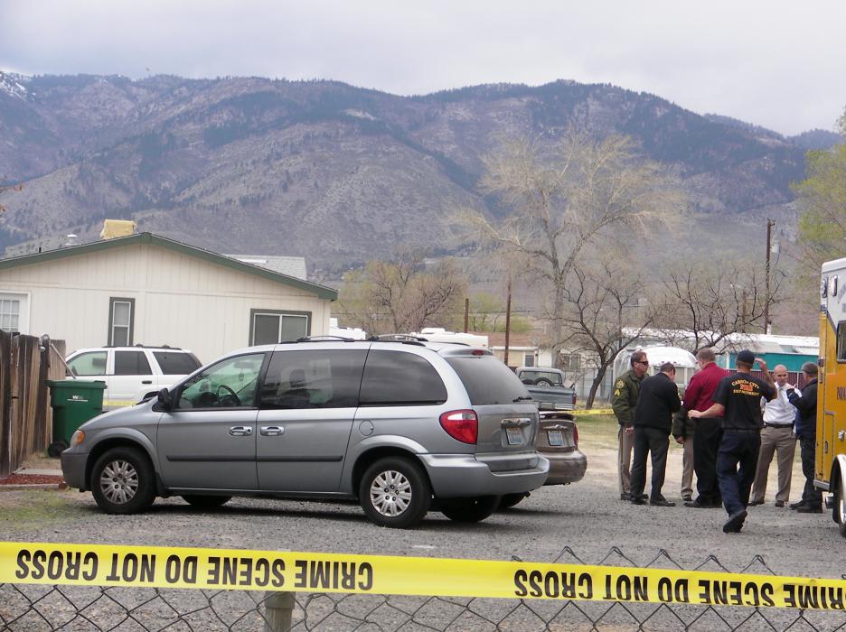 Carson City Sheriff's Office detectives at the crime scene on Dori Way.