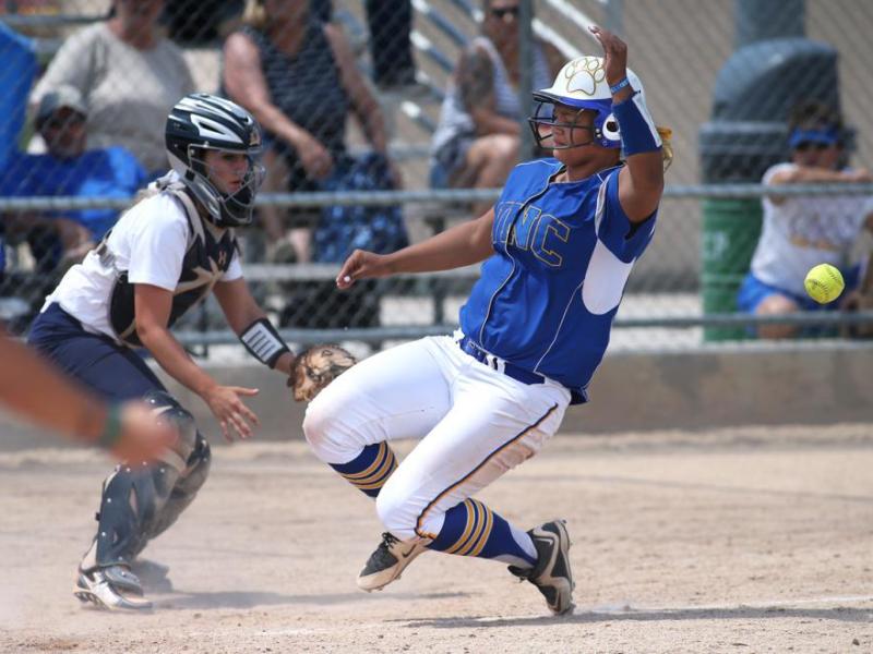 Briauna Carter scores the winning run Saturday against CSN in Carson City. Cathleen Allison, Nevada Photo Source