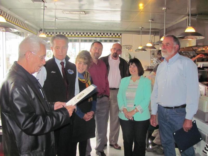 Carson City officials and a rep from Congressman Amodei's office recognize the Cracker Box for 35 years. Photo: Denise Clodjeaux