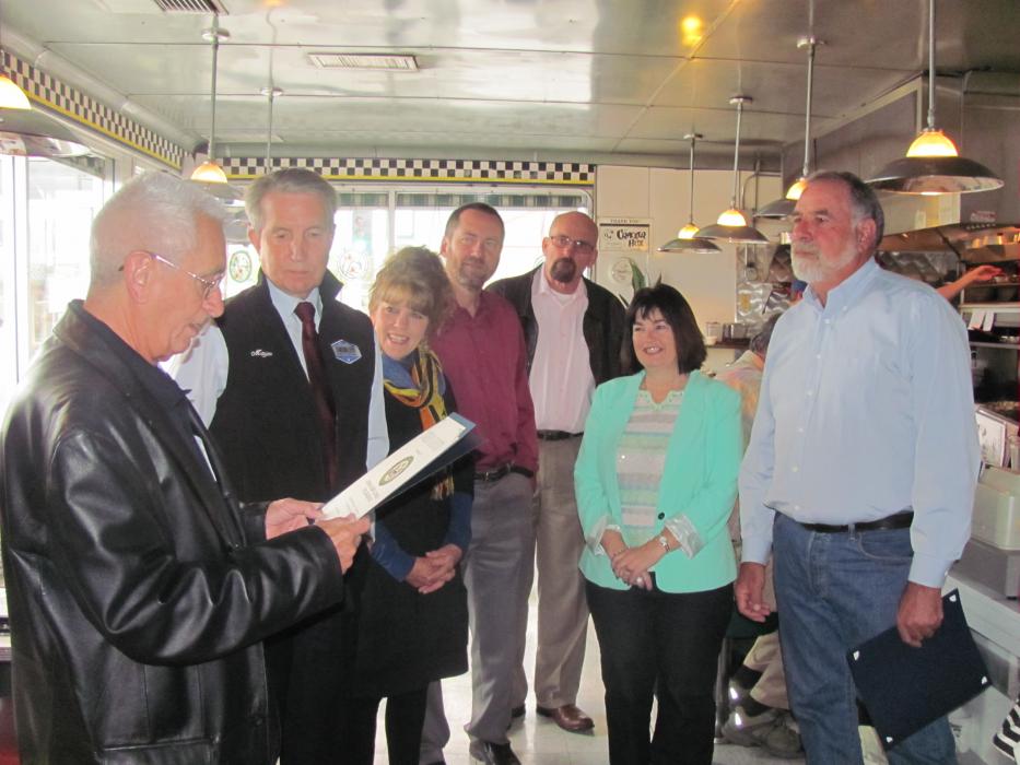 Carson City officials and a rep from Congressman Amodei's office recognize the Cracker Box for 35 years. Photo: Denise Clodjeaux