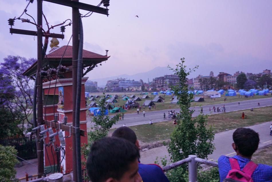 Residents of Kathmandu are staying outdoors following the 7.3 aftershock May 12.