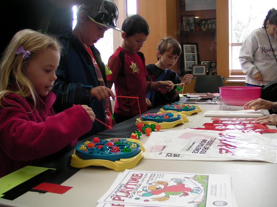 Jenna Jacklett, 4, plays one of the games offered indoors.