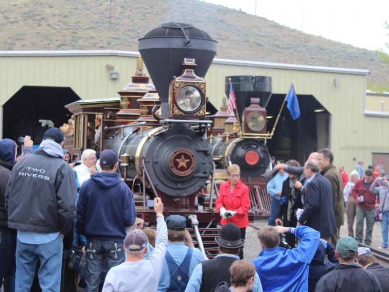 Former First Lady Bonnie Bryan christens the restored locomotive.