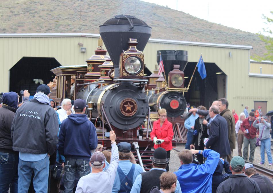 Former First Lady Bonnie Bryan christens the restored locomotive.