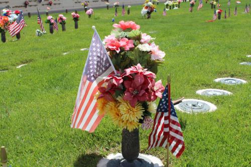 Veteran graves are adorned with flowers and American flags at Waltons Chapel of the Valley. Photo by Rachel Spacek