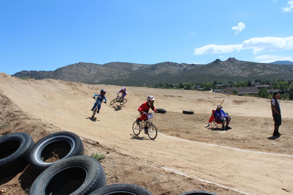 Riders try to use the last steap curve to push ahead of one another