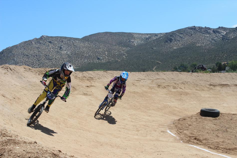 Two riders eye the finish line.