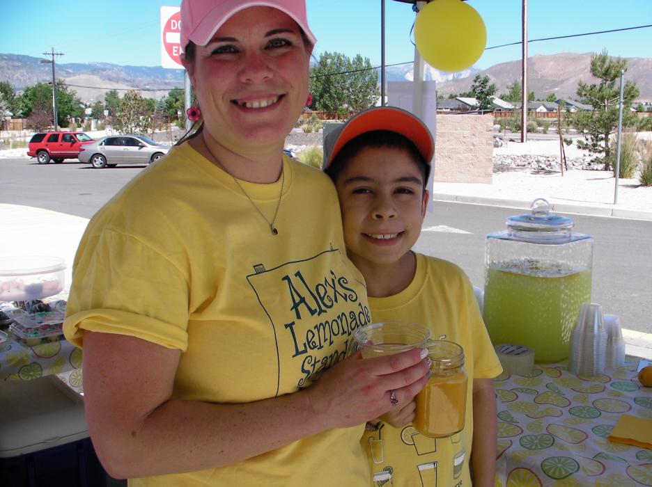 Athena Cox and her son Anthony, 9, at the Alex Foundation Lemonade stand in Carson City.