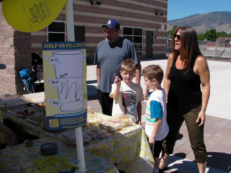 Marc and Wendy Ellis of Carson City brought sons Michael and Daniel to see their friend Anthony at the lemonade fundraiser.