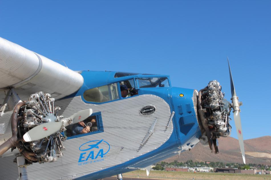 'Tin Goose' pilots get ready to take another group of people up to view Carson City from the air.