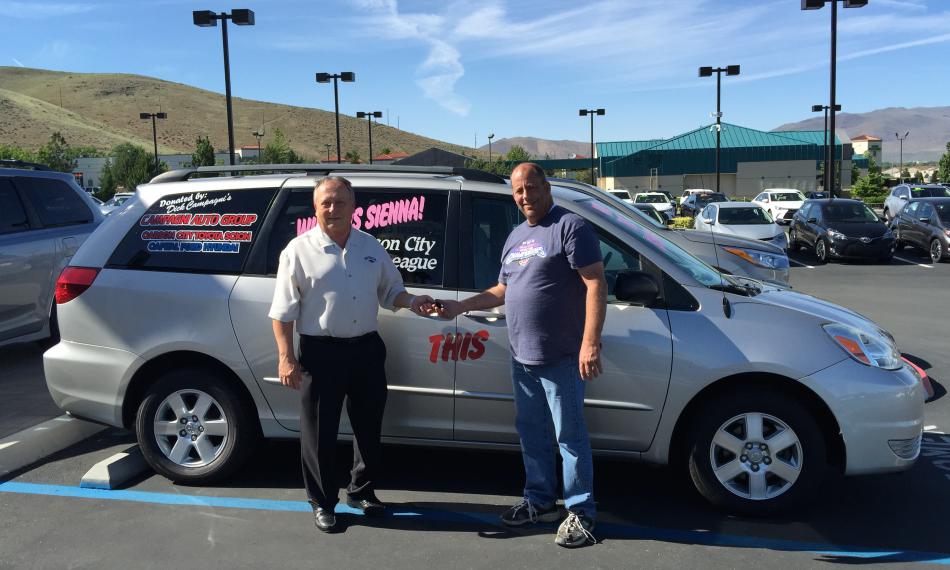 Pictured is Dana Whaley, GM, Carson City Toyota and Jeffrey Ferrel.