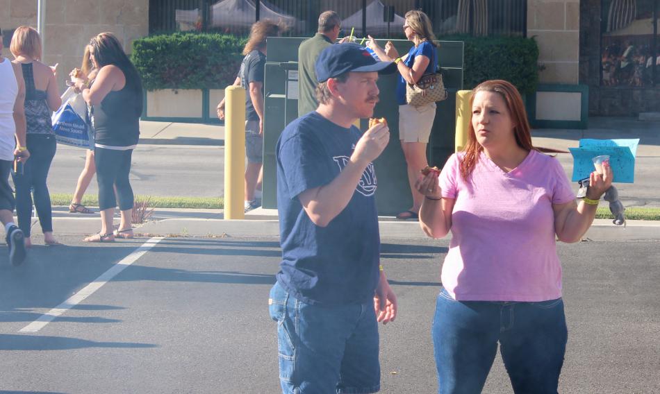 A couple finishes their Johnny Rockets