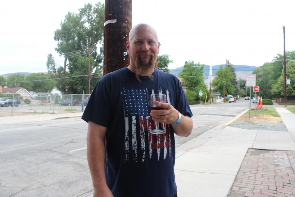 Willie Wemheuer wears his red, white and blue while enjoying a taste of red wine.