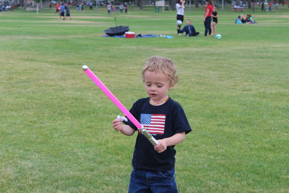 Our hero, Ziah, takes a break from stopping bad guys to enjoy a handful of cotton candy.