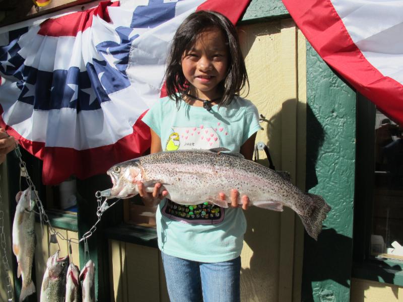 Jackie Bentley of Austin, Texas with a 6 pound 9 ounce Rainbow caught on Power Bait from a boat at Convict Lake.