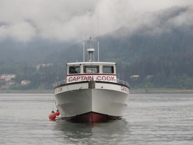 The "Captain Cook" coming to pick up tour passengers. Photo by Elaine Quilici
