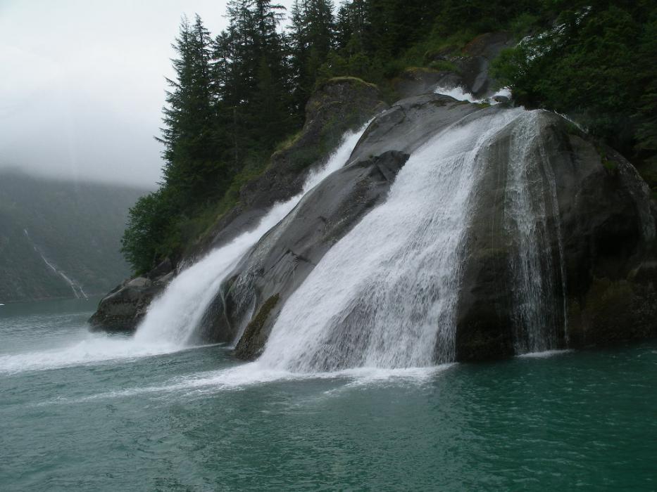 Approaching Icy Waterfalls in the Tracy Fjord. Photo by Elaine Quilici