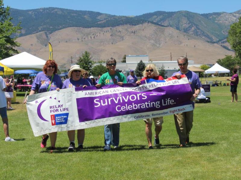 Mayor Bob Crowell and other cancer survivors take the first lap.
