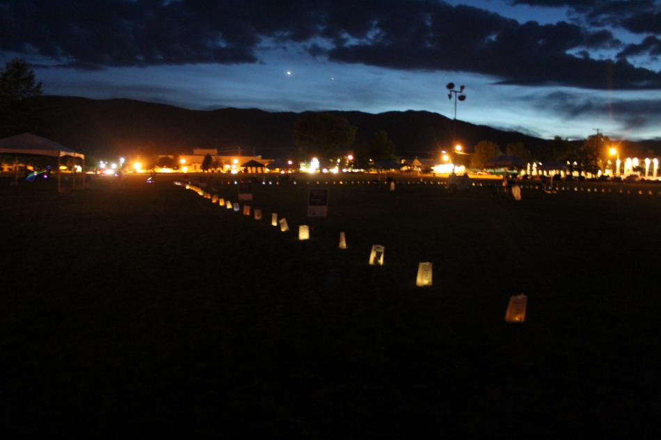 Luminarias line the Mill's Park track