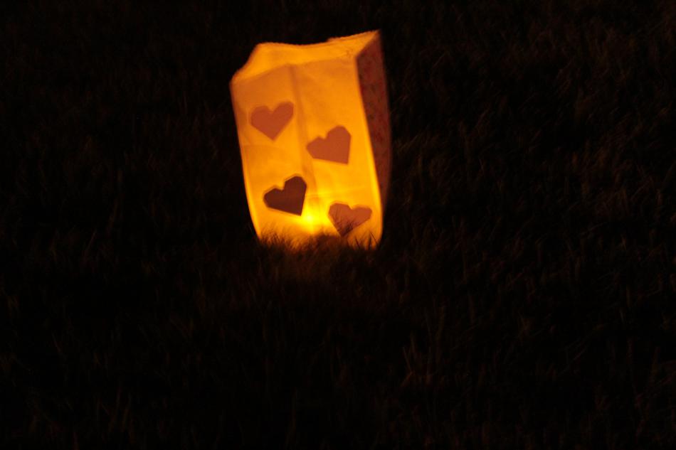 A luminaria adorned with hearts