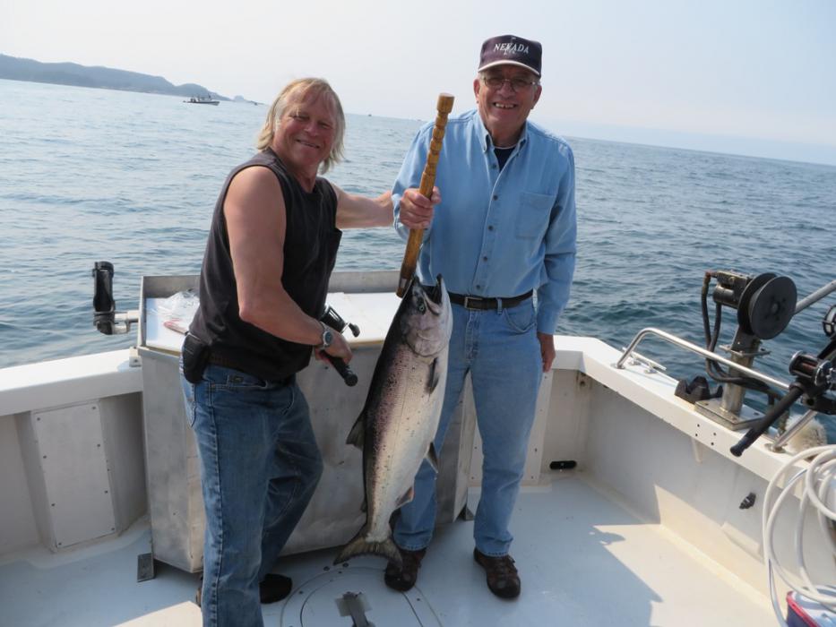 Captain Terry admiring Don's King Salmon.  Photo by Elaine Quilici
