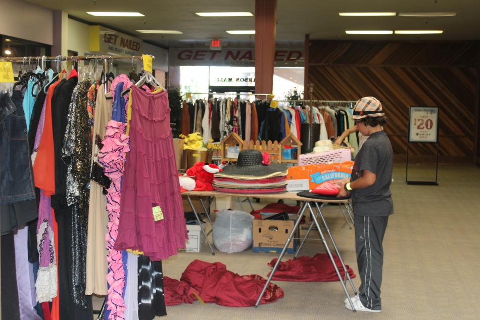 The garage sale attracted people searching for good deals