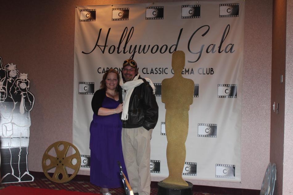 James and Lisa take photos from the paparazzi