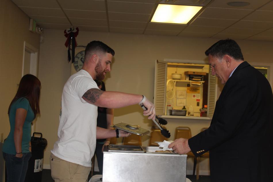 The Student Veterans Club serve pancakes and sausages to Nevada Assemblyman P.K. O'Neill on Sunday morning at the Elks Lodge.