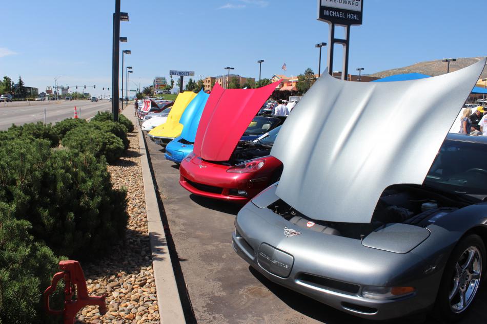 Corvettes are lined up to show off to passers-by