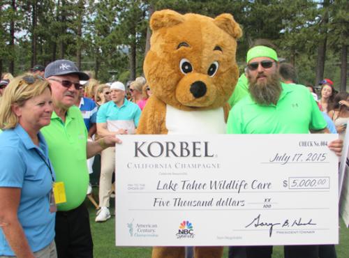 Lake Tahoe Wildlife Care President Sue Novasel, Korbel owner Gary Heck, Tom Millham and Willie Robertson.
