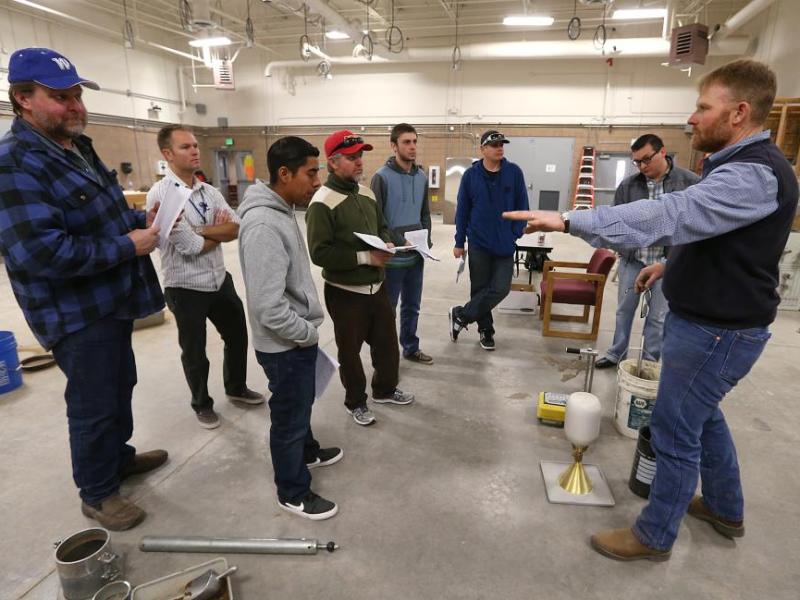 Soils Testing Class Instructor Mitch Burns of Lumos and Associates Engineering teaches students about soils.