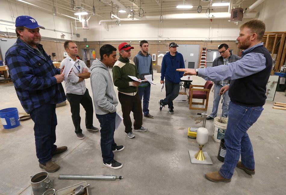 Soils Testing Class Instructor Mitch Burns of Lumos and Associates Engineering teaches students about soils.