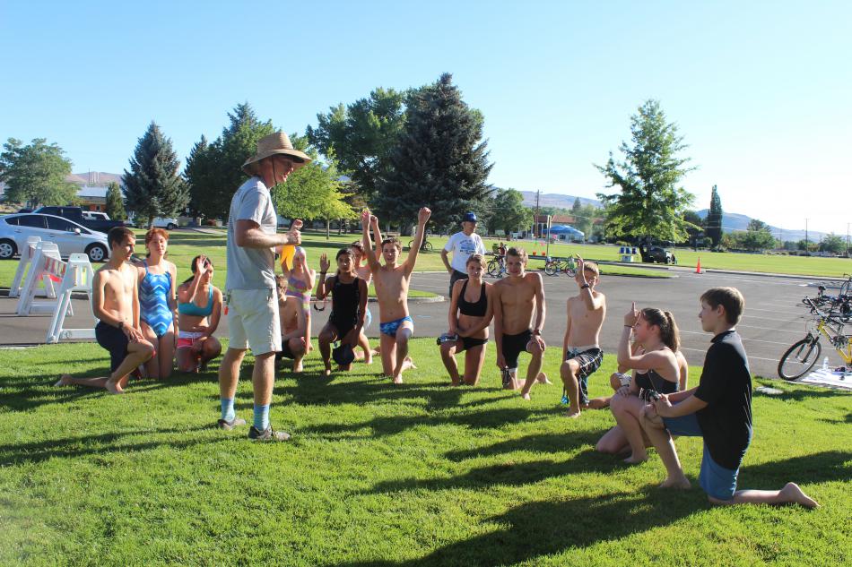The 13 to 18 age group gets a briefing before the race