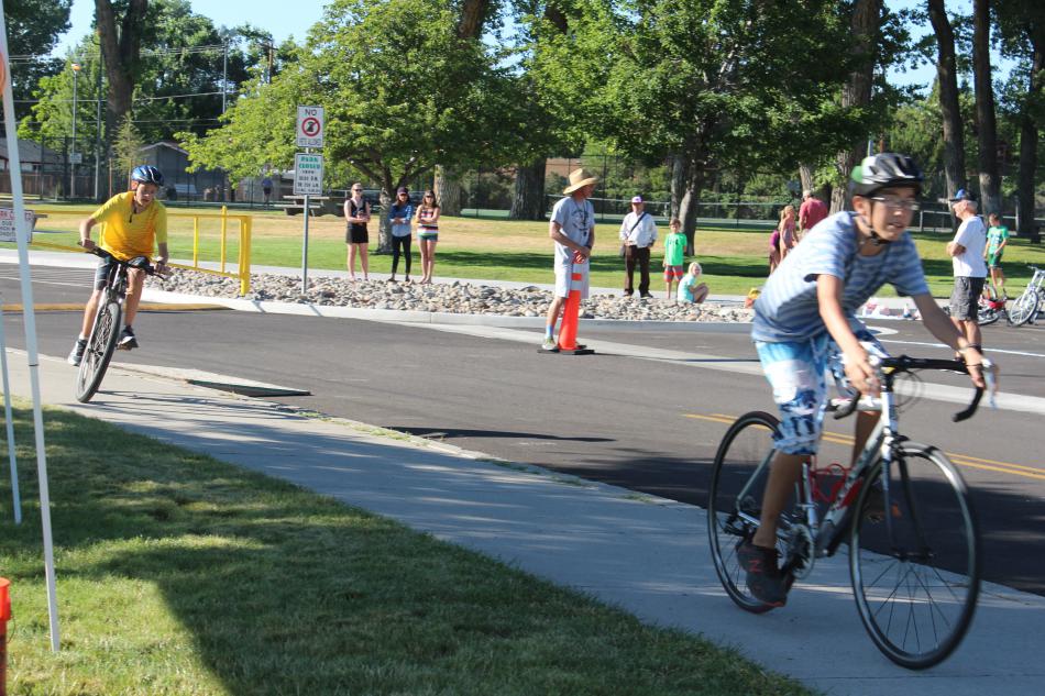 Boys begin the 2.6 mile bike ride