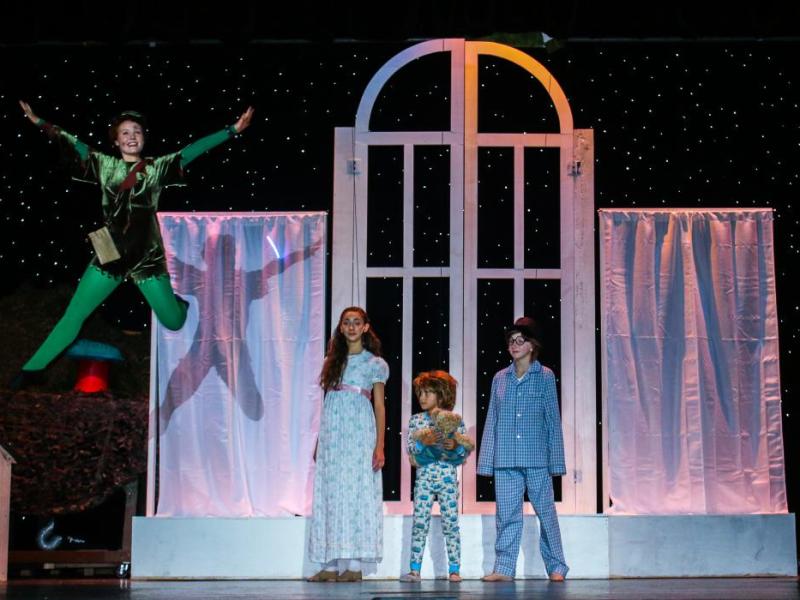 Alexa Haight as Peter Pan, Cassia Giustra as Wendy, Sydney Berg as John, Lily Baum as Michael. Photo by Angila Golik of Golik Photography
