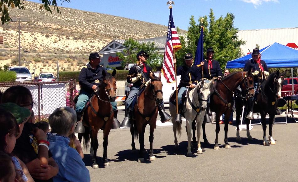 Nevada's first calvery bring in the flags