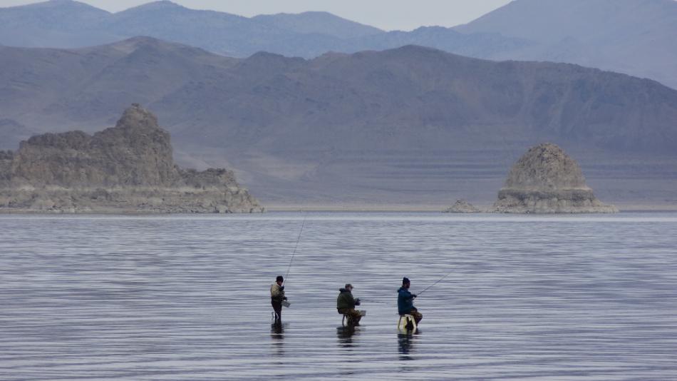 Pyramid Lake fishermen with the pyramid in the background. Photo by Elaine Quilici